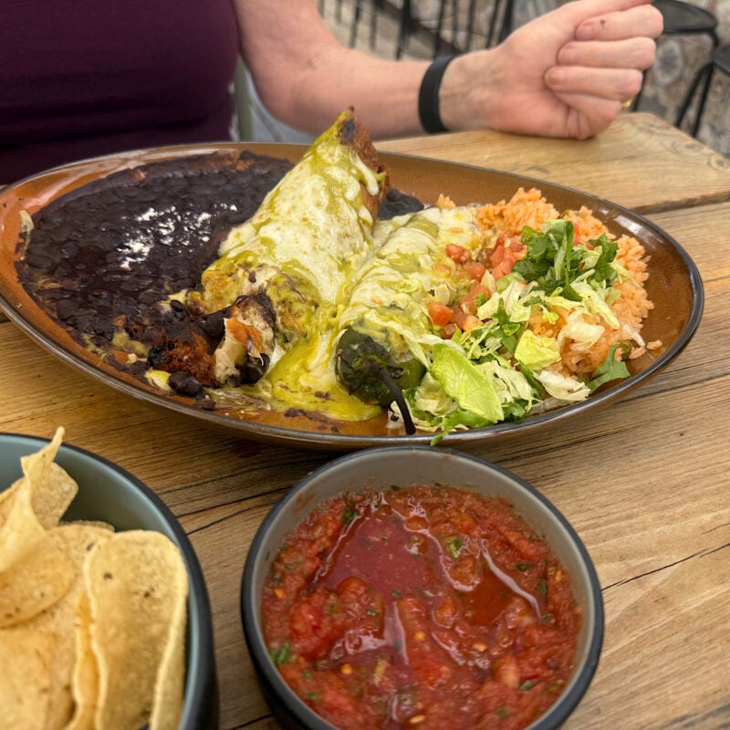 plate of chile rellenos (one baked and one fried) at the Rio Grande Mexican restaurant in Boulder, Colorado.
