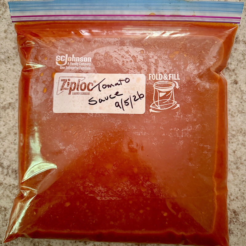 Heirloom tomato sauce, finished and labeled and ready to put in freezer.