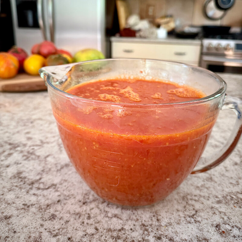 7 pounds of heirloom tomatoes after saucing in an 8-cup container.